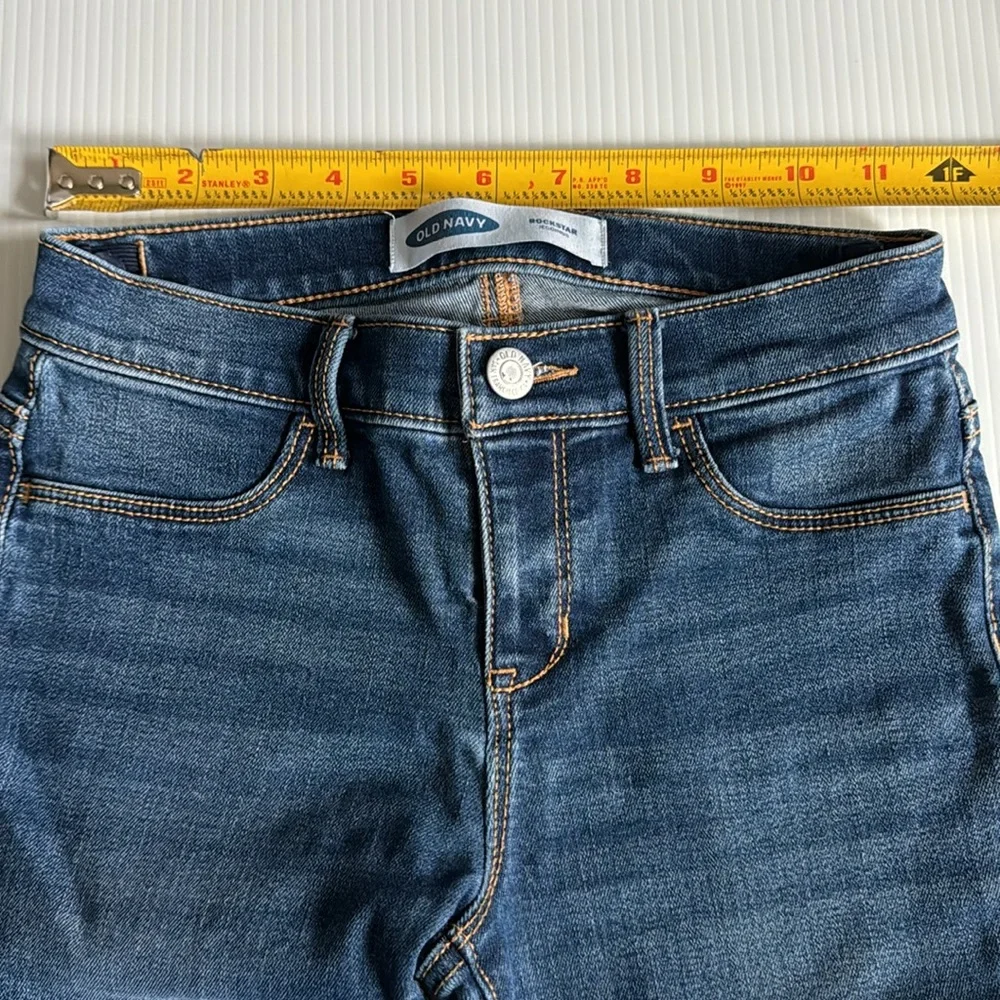 Old Navy Rockstar Jeggings with black sequins star patch.  Girls size 10
